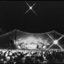 View of 1986 Carols stage, bright star above and some of Melbourne skyline