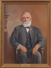 Framed portrait of a seated man.