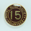 Round badges with '15' on burgundy background