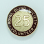 Round badges with '25' on gold cross hatched background