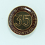 Round badges with '35' on gold background