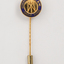 Guiding Light symbol on gold background with 'Association for the Blind honorary service' around the edge