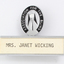 Silver and black guiding light logo with silver name plate underneath and 'Mrs Janet Wicking'