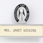 Silver and black guiding light logo with silver name plate underneath and 'Mrs Janet Wicking'