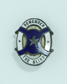 Silver star on dark blue background over a white O