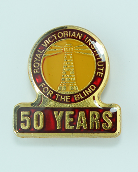 50 Years Badge - Gold lighthouse with red and yellow background