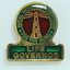 Life Governor badge - Gold lighthouse with green edging and yellow background 