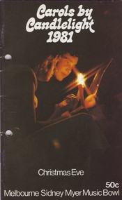 Two people with one holding a candle and the other a song book