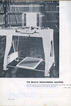 Photo of Braille transcribing machine with shelves of Braille books behind it