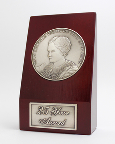 Maroon wooden stand with silver tone inlaid medallion