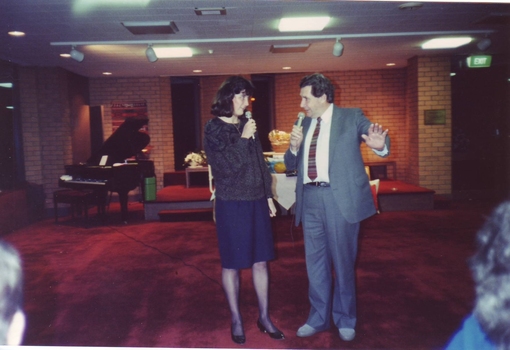 Bob Davis speaking to a female 