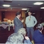 Bob Davis speaking with a younger man