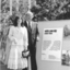 Janene Sadhu with Bill Borthwick next to display boards about White Cane Day