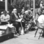 People sitting in chairs at the White Cane Day celebration