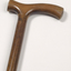 Brown polished wooden cane with handle