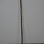 Wooden stick with ornate handle tip