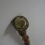 Wooden stick with ornate handle tip
