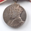 Silver medal with portrait of King and Queen