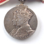 Silver medal with portrait of King and Queen