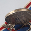 M.A. Aston inscribed on side of medal