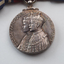 Silver medal with portrait of King and Queen