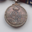 Rear of silver medal with inscription