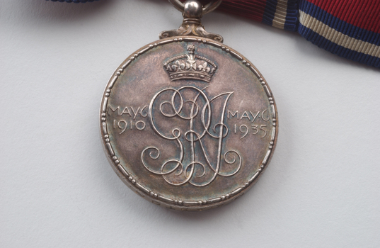 Rear of silver medal with inscription