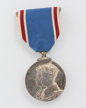 Blue ribbon with hanging silver medal