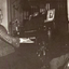 Woman playing organ whilst another woman listens