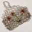 Beaded evening bag with red flowers