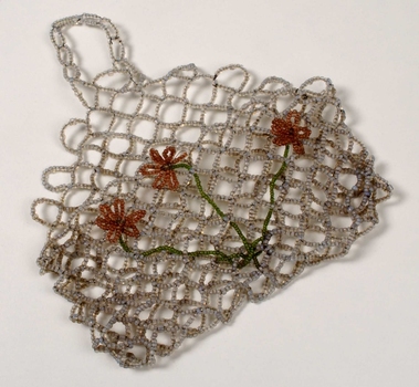 Beaded evening bag with red flowers