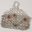 Beaded evening bag with red flowers