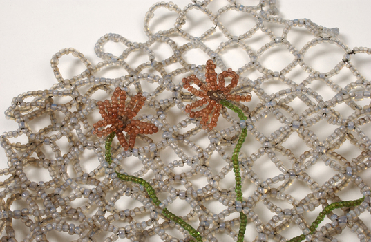 Beaded evening bag with red flowers