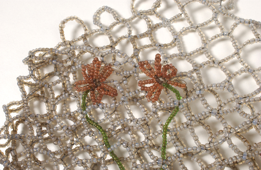 Beaded evening bag with red flowers