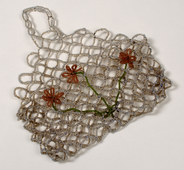 Beaded evening bag with red flowers
