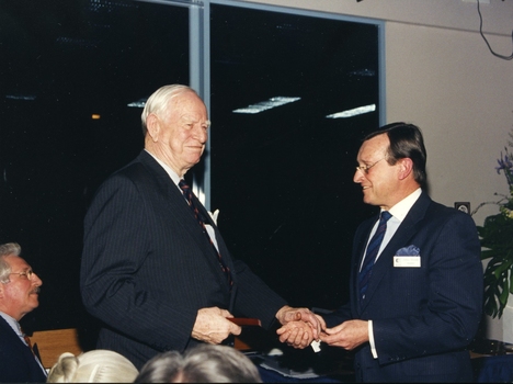 John Moule presenting plaque to John Wicking