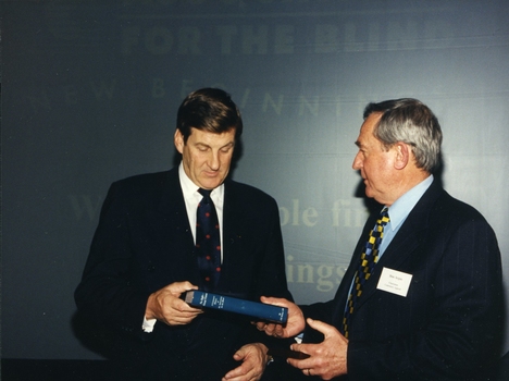 Jeff Kennett receiving book from Don Argus