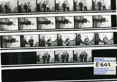Printed negative strip of certificate presented to a photographer