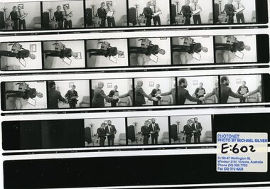 Printed negative strip of certificate presented to a photographer