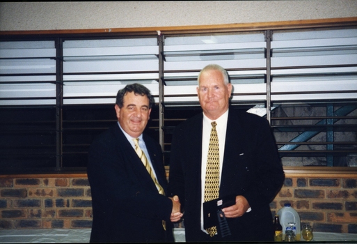 John Puttick presents award to Bill Casey