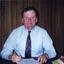 Geoff Melvin, Board Lawyer, at a desk
