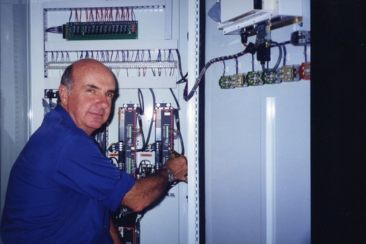 Unidentified man in a fuse box