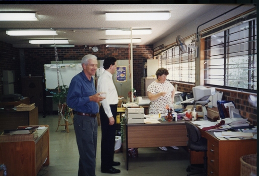 Peter Lynam with two other staff members