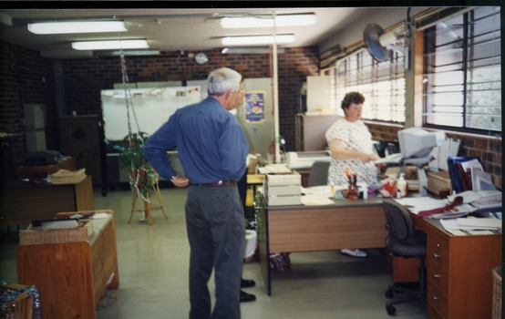 Peter Lynam with two other staff members