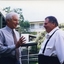 Peter Lynam and Kevin O'Mahoney outside a building