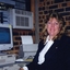 Sue Camps sitting at a computer screen