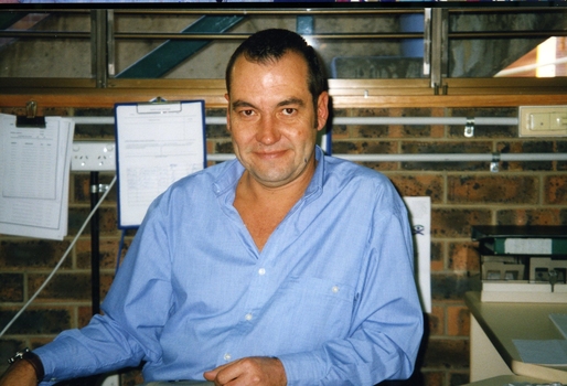 Unidentified man smiles for the camera