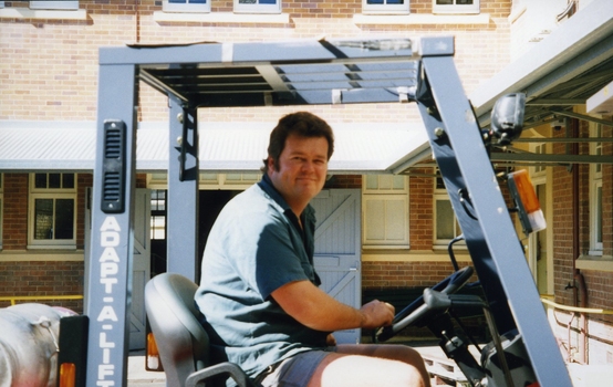 Unknown machine driving a forklift
