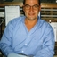Unidentified man sitting at a desk