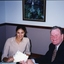 Geoff Melvin hands cheques to unidentified female